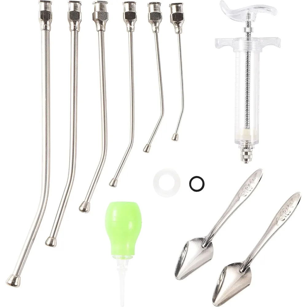 Bird feeding kit contents – syringe, 6 stainless steel gavage tubes, 2 feeding spoons and silicone drinker